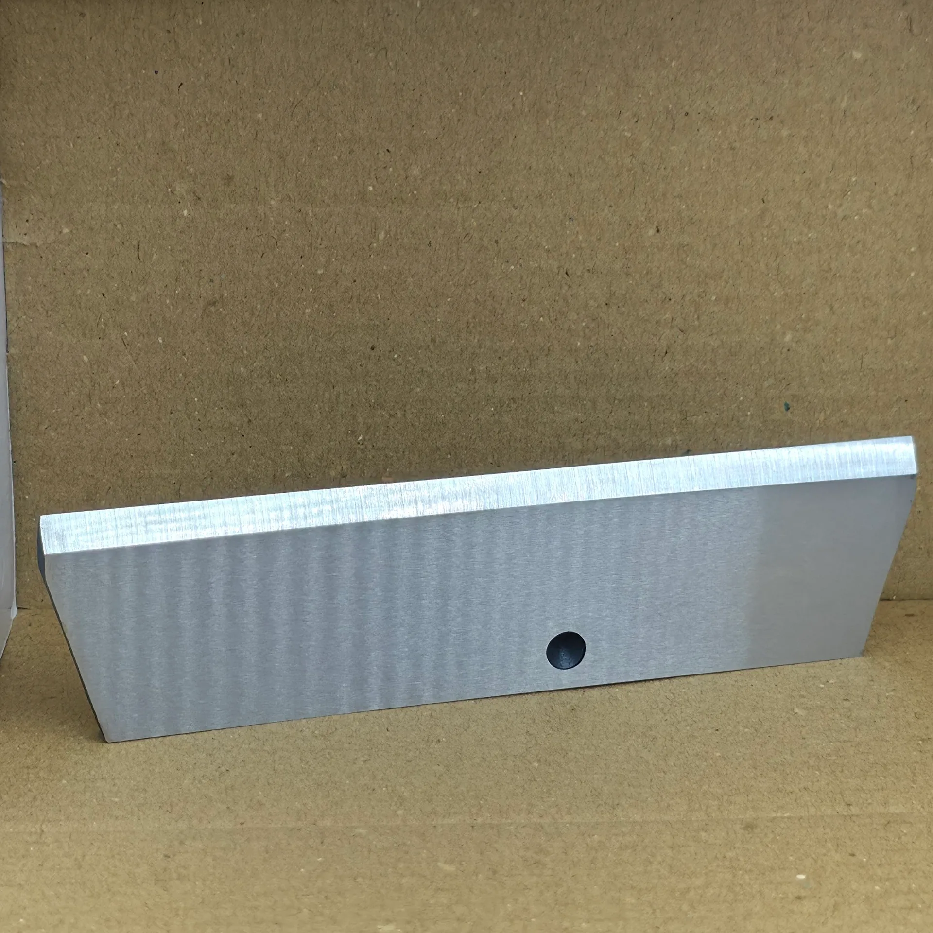 Long cutter compactor rotor knife with ground cutting edge and counterbored fixing hole