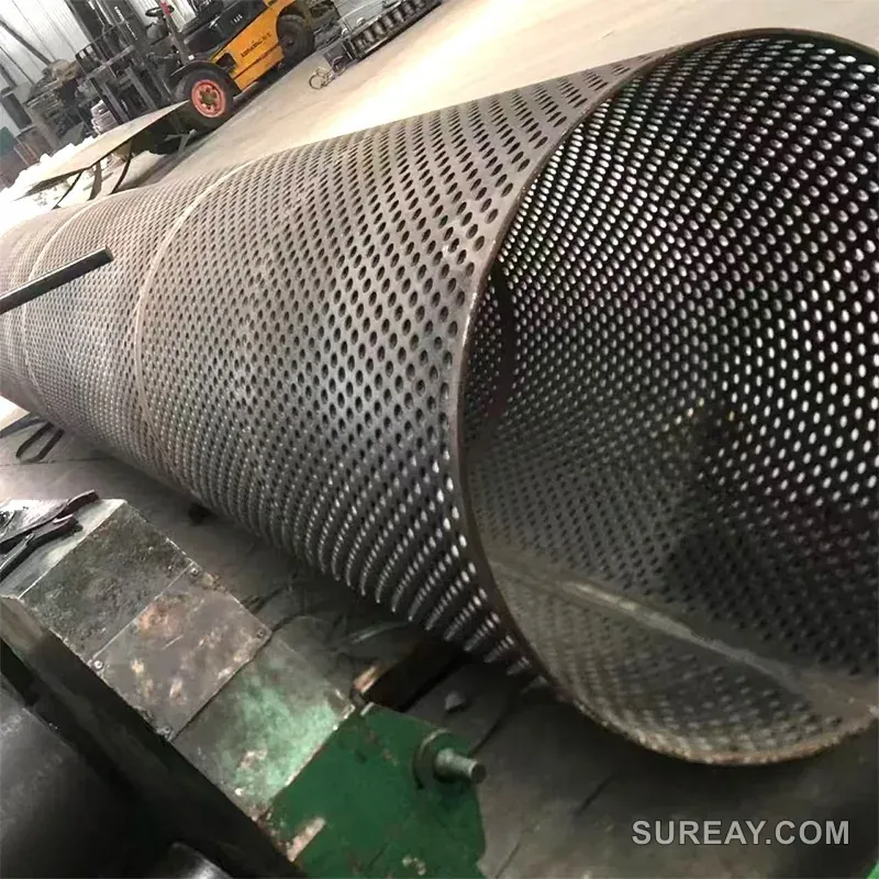 Large-diameter shredder screen basket being rolled and formed in the Sureay workshop